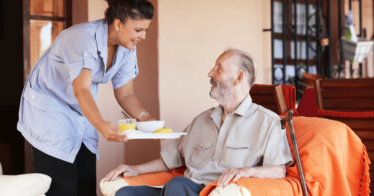 Veteran receiving compassionate home care from professional caregiver in Alameda County